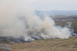 Burning fields. Ecology disaster Wildfire. Aerial view