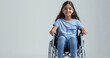 Happy teenage girl wearing blue T-shirt in wheelchair on white background