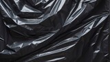 Fototapeta Przestrzenne - Plastic wrap creases on a dark surface.