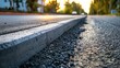 Concrete curb dividing a road