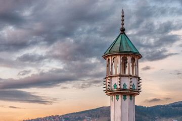 Wall Mural - architectural marvels of Sarajevo's wooden mosque minarets, reflecting the intricate craftsmanship of Ottoman design and Bosnian culture.