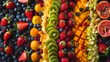 An overhead shot of a vibrant fruit salad arranged in an artistic pattern, showcasing the beauty of nature's palette.