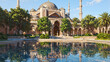 Mosque with reflecting pool on  a bright sunny day