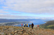 Tourists on the mountain Fløya with a view towards Tromsø city	