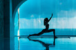 A yoga instructor in a dynamic pose, the room bathed in a peaceful azure background, emphasizing balance and wellness