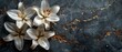 A minimalist grey marble background, with subtle gold inclusions, decorated with white lily petals and soft grey silk. 