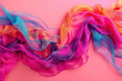colorful silk scarves in motion on a bright pink background with a dynamic flow