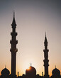 Silhouette of Mosque Building With Sunset for Eid  Background