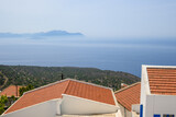 Fototapeta Konie - The mountain village of Nikia – characteristic Greek isles architecture, views of a Aegean Sea