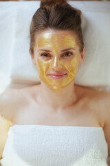 Poster - Upper view of relaxed woman in spa salon laying on massage table