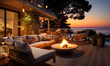 Luxurious oceanfront villa terrace with fireplace and patio set, enjoying stunning sunset views over the sea