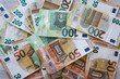 European Union banknotes spread out on the desk, 50, 100, 200 euros