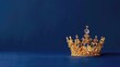 Golden crown with gemstones on blue background