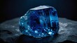 Sapphire stone with deep blue color perfectly cut with many facets that reflect light in different directions
