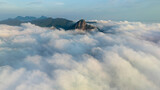 Fototapeta Mapy - Aerial view of sea of clouds below Corcovado Hills and and other mountains, Rio de Janeiro