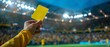 A photograph depicting a guy referee brandishing a yellow card over a backdrop of a football stadium sporting multiple lights on and space, Generative AI.