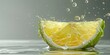 A close shot of a slice of lemon on water with a drop of juice falling above of it with a big blurry space for text or product advertisement backdrop, Generative AI.