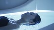 A person floating in a sensory deprivation tank using the absence of external stimuli to tap into and explore their subtle energy fields. .
