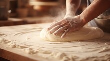 Fresh Dough Being Shaped Into Loaves, Close-up, Showcasing The Smooth Texture And Artisan Techniques On A Wooden Board. 