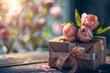 Pink tulips on a wrapped present with a bow on a wooden table against a blurred background of pink flowers in a painterly style