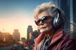 Stylish elder Caucasian woman in headphones walks around the city, listening to her favorite radio through an online smartphone application and headphones.