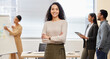 © peopleimages.com - Business, portrait and arms crossed by happy woman with office team for training, presentation or solution collaboration. Leadership, meeting or group partnership for coaching, research or discussion