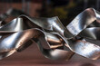 Abstract steel metal curves and waves close-up