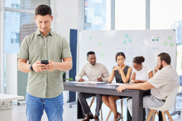 Poster - Man, phone and texting in boardroom with colleagues, workshop and networking for deal at startup. Business people, employee or person with smartphone, reading and typing for chat on social media app