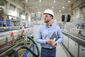 Wall Mural - Engineer,Industry and construction concept. Portrait of caucasian Industry factory maintenance engineer