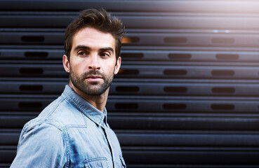 Poster - City, face and man in fashion, thinking and outdoor in morning, ideas and planning to travel or explore. Wall background, tourist and person with confidence in trip, wondering and street of New York