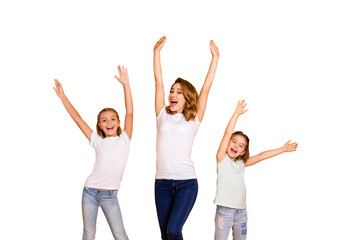 Sticker - Portrait of three nice cute adorable lovely slim attractive cheerful cheery positive people mum having fun raising hands up isolated over bright vivid shine yellow background