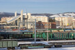 Freight trains at the railway station. View of freight cars and the station. Cargo delivery by rail. Baikal-Amur Mainline (BAM). Severobaikalsk city, Republic of Buryatia, Siberia, Russia.