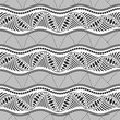 Seamless ethnic vector pattern. Ornamental wavy striped pattern. Ethnic background. African style pattern. Black and white seamless tribal wavy background. For textile, fabric, wallpaper, wrapping.