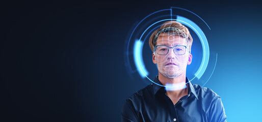 Poster - A man with digital facial recognition overlays on a blue backgro