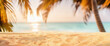 Summer blurred natural panoramic background of tropical beach with palm trees and golden sand at sunset.