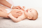 Fototapeta  - Baby chest massage