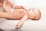 Fototapeta  - Baby chest massage