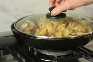 Wall Mural - Fried potatoes with chanterelles