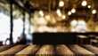 Wooden Table in Focus with Blurred Café Background
