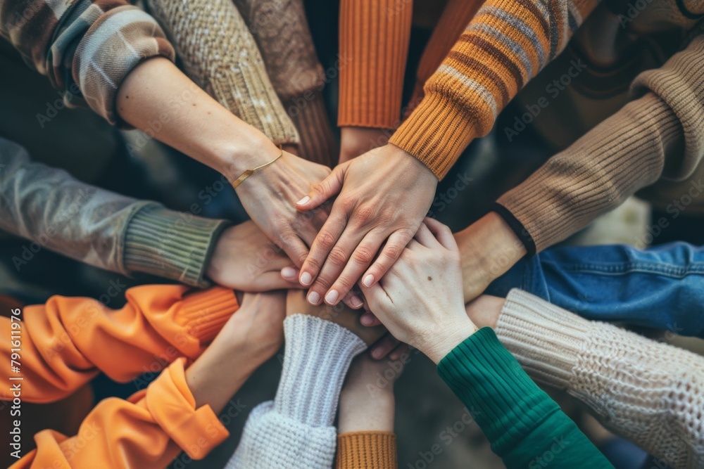 Diverse group of people embracing in unity - equity and inclusion ...