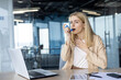 © Tetiana - Businesswoman using inhaler during asthma attack in office