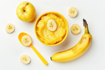 Wall Mural - A bowl of banana butter next to bananas and apples. Perfect for healthy eating concepts