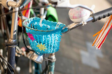 Blue Bike Basket With Tassels And A Bell.