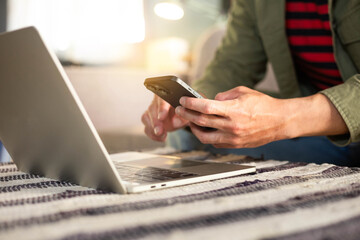 man work texting cell phone using typing computer.student study education online learning.adult professional chatting on laptop,mobile contact us at Thinking business plan.connecting people concept