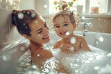 Fototapeta  - Caucasian mother bathing together with baby toddler. Cosy bathroom with natural light, mom and child playing with foam, happy and playful atmosphere. Hygiene for children, childcare. Daily routine