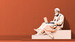 A statue of a man sitting on a step with a laptop in front of him