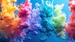 Colorful rainbow paint drops mixing in water. Ink swirling underwater