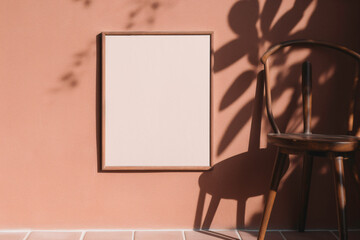 Wall Mural - a chair and a picture frame on a wall