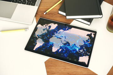 Poster - Modern digital tablet display with abstract creative world map, research and analytics concept. Top view. 3D Rendering