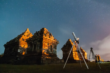 Wall Mural - Sleman, Indonesia - July 14,  2015. Observation of the sky at Ijo Temple with the Milkyway in the background.